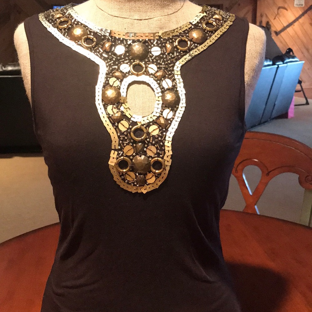 Dark brown sleeveless top with gold/ brass detail
